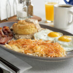 Biscuits & Gravy with Sunny Side Up Eggs & Bacon