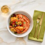 Smoky Harissa Mashed Potatoes Served with Chicken Tajine
